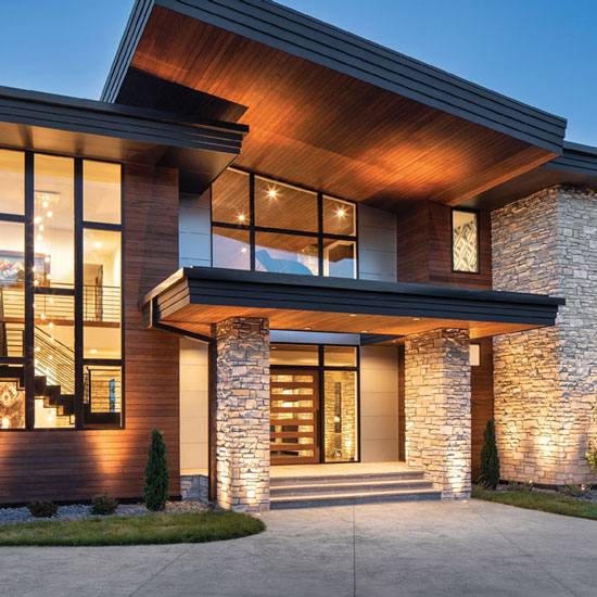 A modern house with a unique front door in Oklahoma City, OK